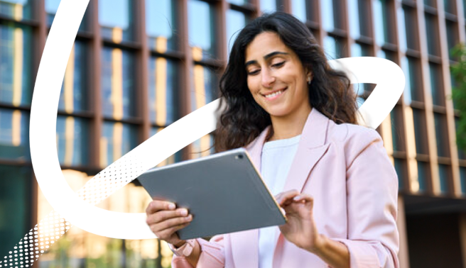 Valamis compliance checklist image showing a woman on a tablet checking the training list
