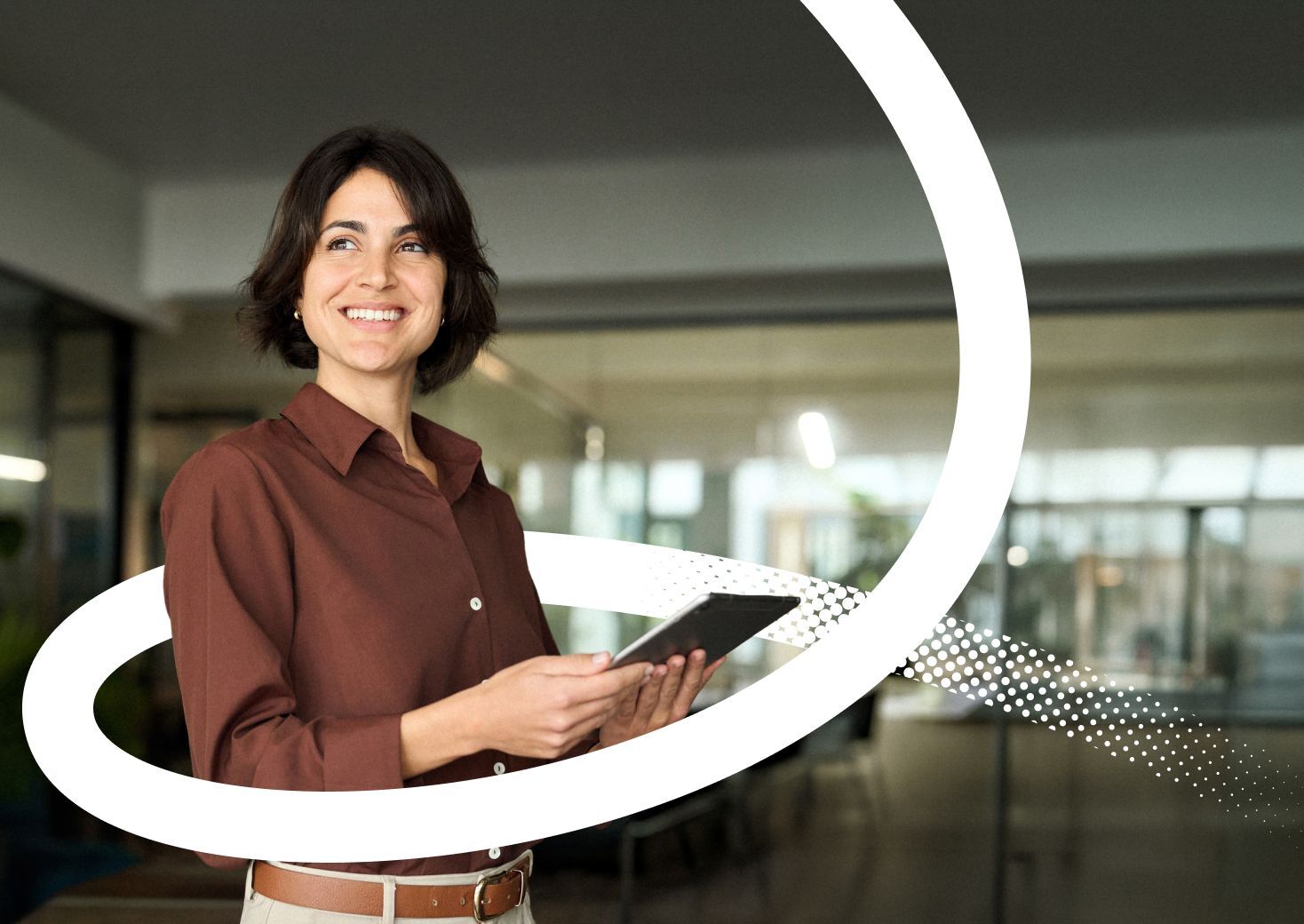 A Valamis branded image of a women holding a tablet. Part of the Fosway AI research assessment 2026 for Valamis