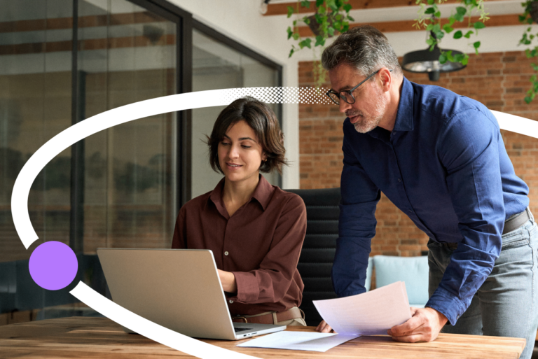 An image of a mentor with a colleague, a Valamis-branded graphic to support the concept of AI adoption readiness in the workplace